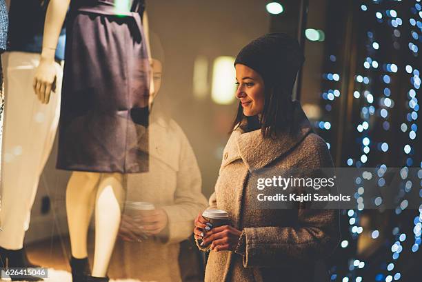 young woman shopping in budapest - window shopping stock pictures, royalty-free photos & images