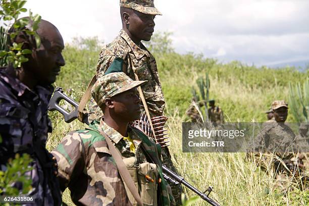 Military personnel patrols on November 29, 2016 in Kasese, as Ugandan prosecutors charged a tribal king with murder accusing him of backing a...