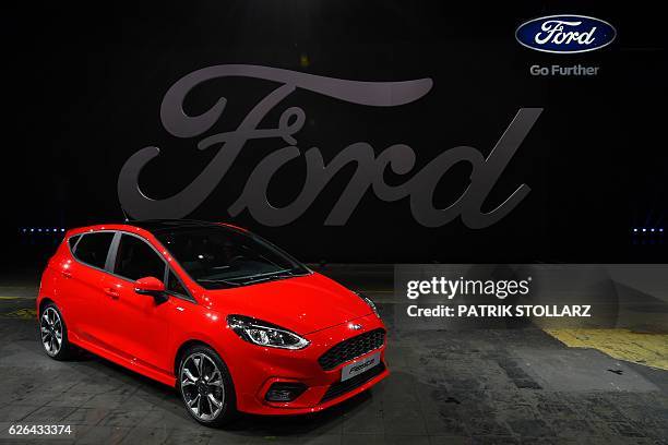 New model Ford Fiesta of automotive manufacturer Ford is presented in Cologne, western Germany, on November 29, 2016. / AFP / PATRIK STOLLARZ