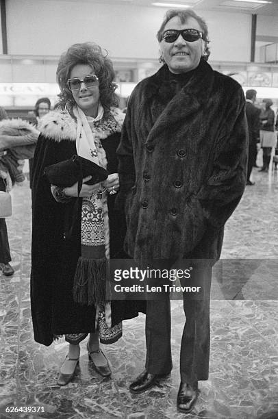 Actors Elizabeth Taylor and her husband Richard Burton at London Airport , 4th March 1971.