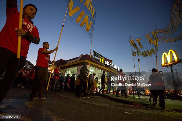 McDonald's restaurant employees rally after walking off the job to demand a $15 per hour wage and union rights during nationwide 'Fight for $15 Day...