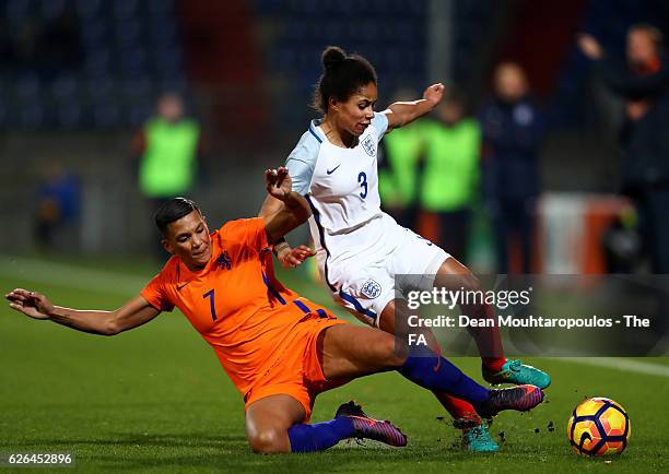 Demi Stokes of England Women is tackled by Shanice van de Sanden of Netherlands Women during the international friendly match between Netherlands...
