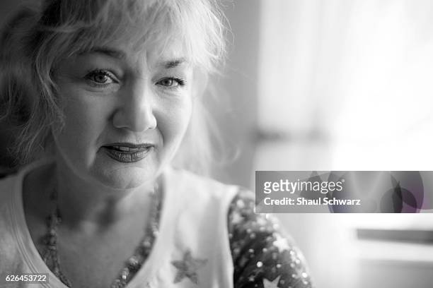 Terry Taggart poses for a portrait at her home. Terry lives with bipolar disorder and post-traumatic stress disorder . She devotes her time to two...