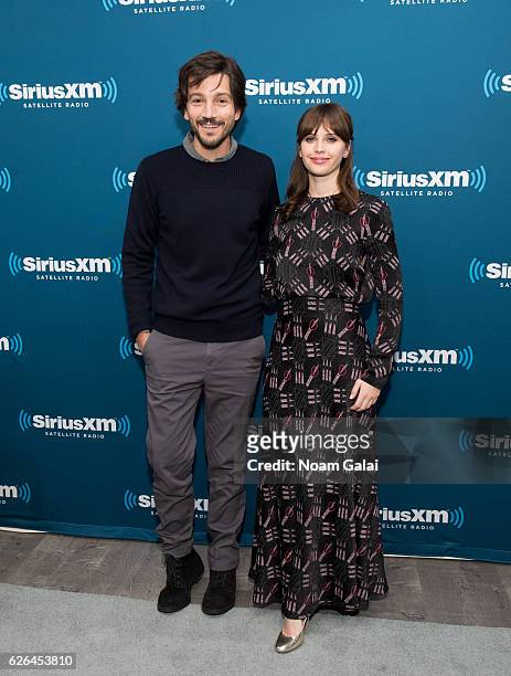 Actors Diego Luna and Felicity Jones visit the SiriusXM Studio on November 29, 2016 in New York City.