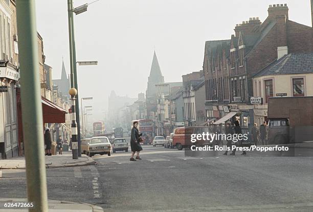 View of residents and shoppers walking across and along the Shankhill Road, scene of a number of recent sectarian attacks, in loyalist West Belfast,...