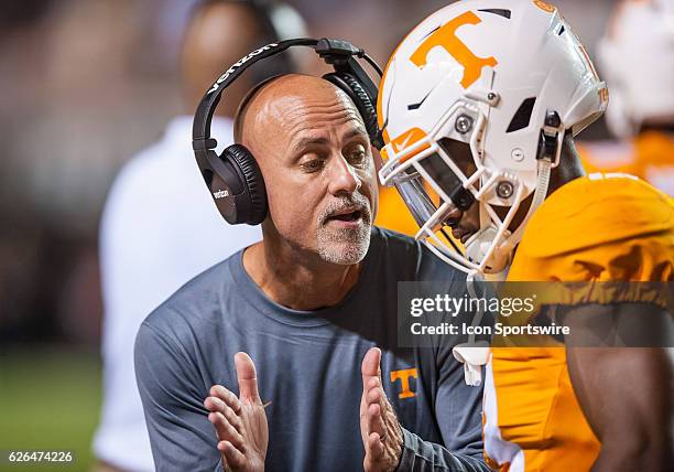 Tennessee Volunteers defensive backs coach Willie Martinez talks to one of his players during a game between the Tennessee Volunteers and Appalachian...