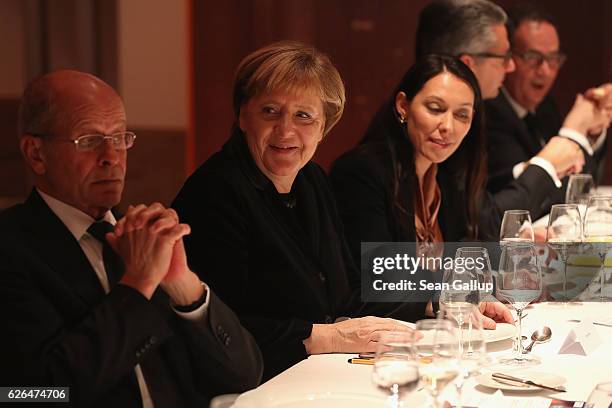 German Chancellor Angela Merkel attends the gala event of the 200th birthday of Werner von Siemens next to Berthold Huber, president of the Siemens...