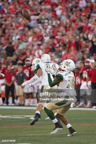 Charlotte 49ers wide receiver Chris Montgomery receives the ball during the 1st half of the NCAA football game between the Louisville Cardinals and...