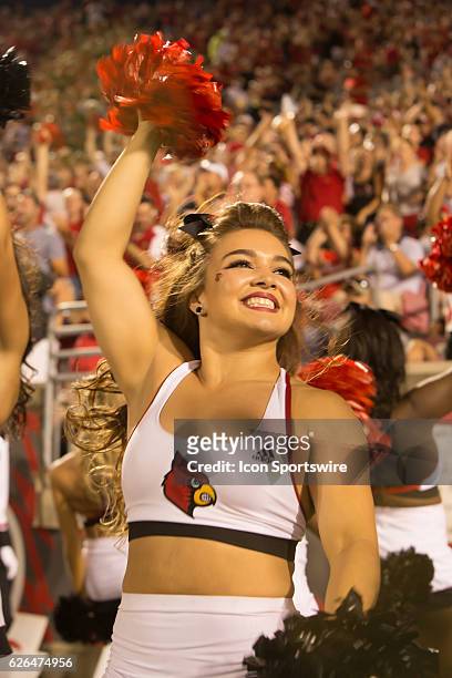 Louisville cheerleader celebrate a touchdown during the 2nd half of the NCAA football game between the Louisville Cardinals and the Charlotte 49ers...