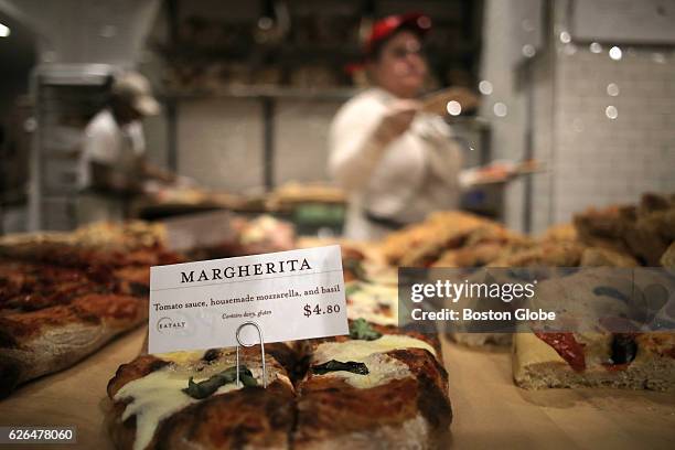 Pizza and breads entice customers at Eataly in the Prudential Center in Boston on Nov. 29, 2016. The Italian food court and market is opening today...