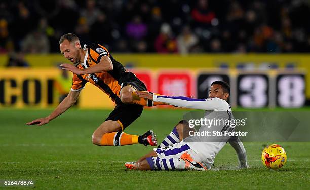 Isaac Hayden of Newcastle United tackles David Meyler of Hull City during the EFL Cup Quarter-Final match between Hull City and Newcastle United at...