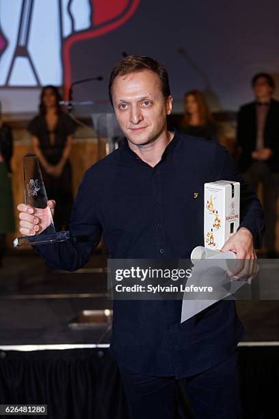 Russian actor Vladimir Mishukov, receives the winner of the Best Actor award, during Russian Film Festival on November 26, 2016 in Honfleur, France.