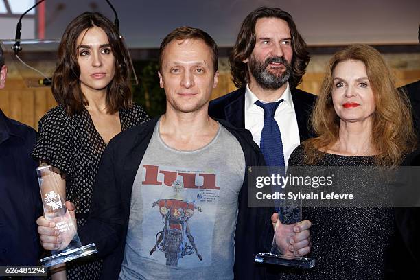 Russian actor Vladimir Mishukov , Best Actor award, poses with jury members Victoria Olloqui, Frederic Beigbeder and Cyrielle Clair during Russian...