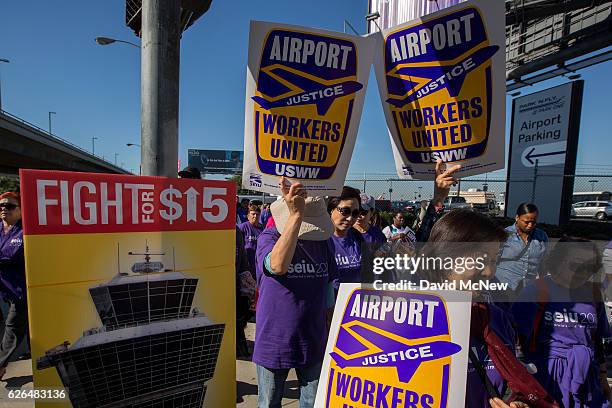 Fast-food, airport, home care and other workers protest to call for a higher minimum wage at Los Angeles International Airport during nationwide...