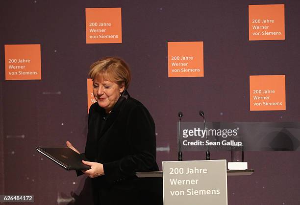 Chancellor Angela Merkel speaks during the 200th birthday celebration of Werner von Siemens on November 29, 2016 in Berlin, Germany. Von Siemens,...