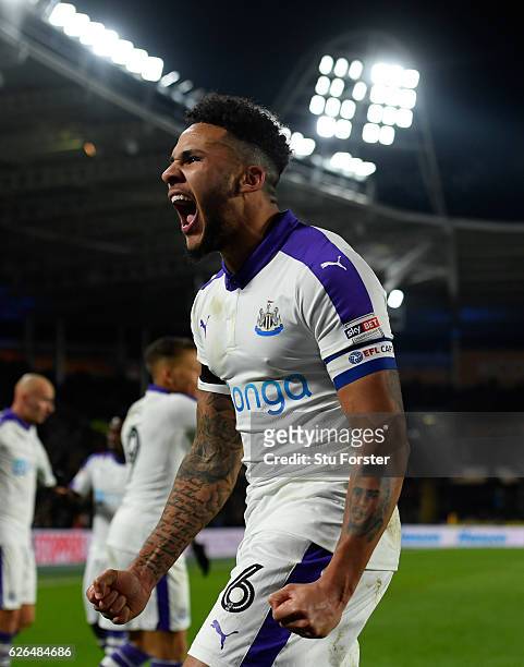 Jamaal Lascelles of Newcastle United celebrates as Mohamed Diamé of Newcastle United scores their first goal during the EFL Cup Quarter-Final match...
