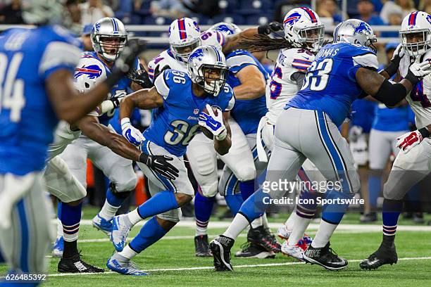 Detroit Lions running back Dwayne Washington carries the ball during game action between the Buffalo Bills and the Detroit Lions during a preseason...