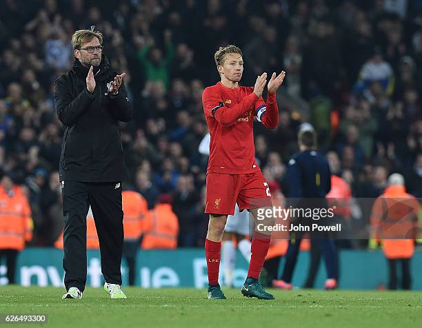Jurgen Klopp Manager of Liverpool and Lucas applaud at the end of the EFL Cup Quarter-Final match between Liverpool and Leeds United at Anfield on...