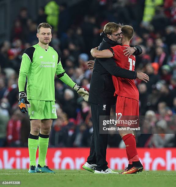 Jurgen Klopp Manager of Liverpool and Lucas hug at the end of the EFL Cup Quarter-Final match between Liverpool and Leeds United at Anfield on...