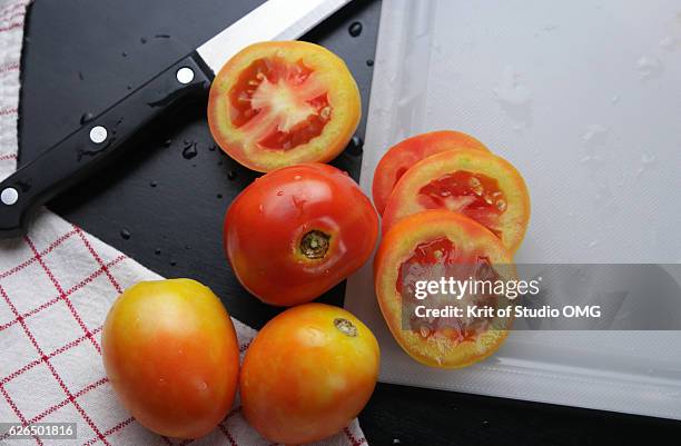 ripe tomatoes in cooking - plum tomato stock pictures, royalty-free photos & images