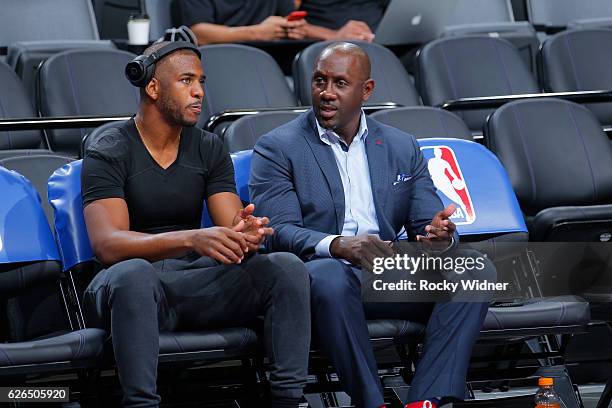 Chris Paul of the Los Angeles Clippers talks with Bobby Jackson before the game against the Sacramento Kings on November 18, 2016 at Golden 1 Center...