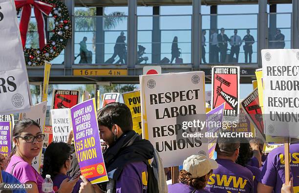 Some 200 low wage workers rally in a protest named "Day of Disturbance" to demand higher wages on November 29, 2016 at San Diego International...