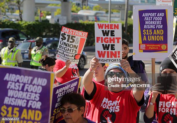 Some 200 low wage workers rally in a protest named "Day of Disturbance" to demand higher wages on November 29, 2016 at San Diego International...