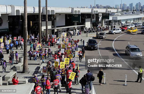 Some 200 low wage workers rally in a protest named "Day of Disturbance" to demand higher wages on November 29, 2016 at San Diego International...