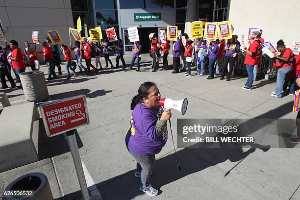 Some 200 low wage workers rally in a protest named "Day of Disturbance" to demand higher wages on November 29, 2016 at San Diego International...