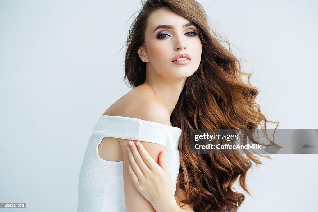 Beautiful woman wearing cocktail dress