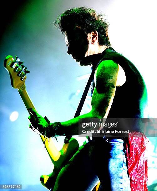 Simon Gallup of The Cure performs at Manchester Arena on November 29, 2016 in Manchester, United Kingdom.