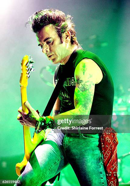 Simon Gallup of The Cure performs at Manchester Arena on November 29, 2016 in Manchester, United Kingdom.