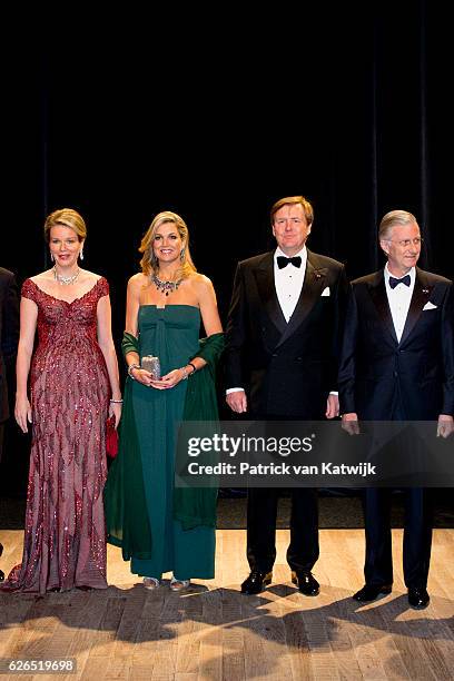 Queen Mathilde, Queen Maxima, King Willem-Alexander and King Philippe at the start of the concert offered by the Belgian King in the Muziekgebouw...