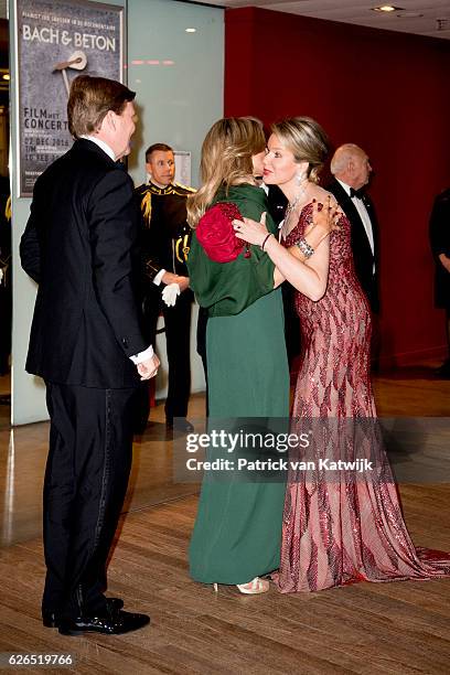 King Willem-Alexander and Queen Maxima of The Netherlands welcomed by Queen Mathilde at the start of the concert offered by the Belgian King in the...