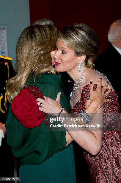 Queen Maxima welcomed by Queen Mathilde at the start of the concert offered by the Belgian King in the Muziekgebouw Aan't IJ Amsterdam on November...