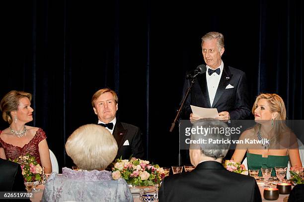 King Philippe give a speech during a dinner with King Willem-Alexander, Queen Maxima, Queen Mathilde and Princess Beatrix in the Muziekgebouw Aan't...