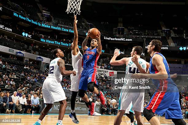 Michael Gbinije of the Detroit Pistons goes to the basket against the Utah Jazz on November 29, 2016 at Spectrum Center in Charlotte, North Carolina....