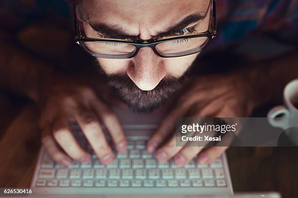 computer hacker stealing information with laptop - hotelse bildbanksfoton och bilder