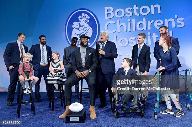 New England Patriots Martellus Bennett laughs along with Jay Leno and teammates Nate Solder, Sebastian Vollmer, Geneo Grissom, Rob Ninkovich, and...