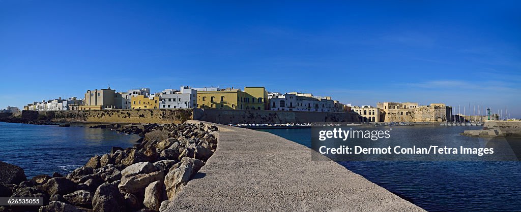 Italy, Puglia, Ostuni, City skyline from pier