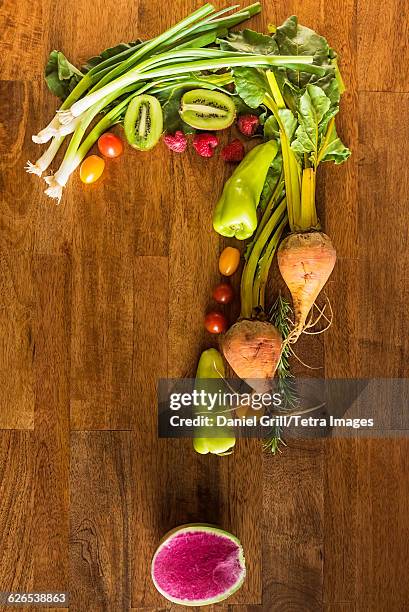 question mark shape made with fruit and vegetables - golden beet stock pictures, royalty-free photos & images