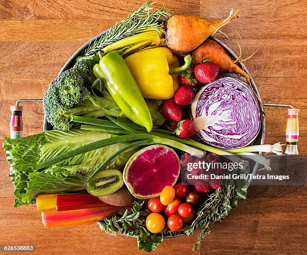 fruit and vegetables and herbs on tray - golden beet stock pictures, royalty-free photos & images