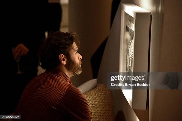 Guests attend the Audemars Piguet Art Commission Presents "Reconstruction of the Universe" By Sun Xun on November 29, 2016 in Miami Beach, Florida.