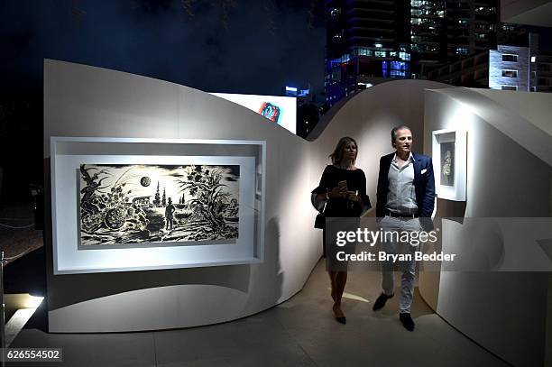 Guests attend the Audemars Piguet Art Commission Presents "Reconstruction of the Universe" By Sun Xun on November 29, 2016 in Miami Beach, Florida.