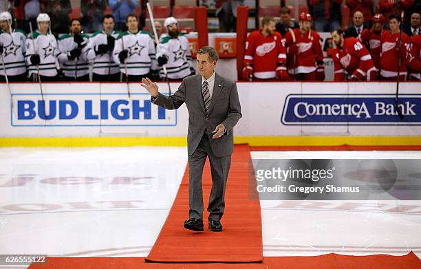 Red Wing Hall of Famer Ted Lindsay comes out for a ceremonial puck drop prior to the Dallas Stars and Detroit Red Wings playing at Joe Louis Arena on...