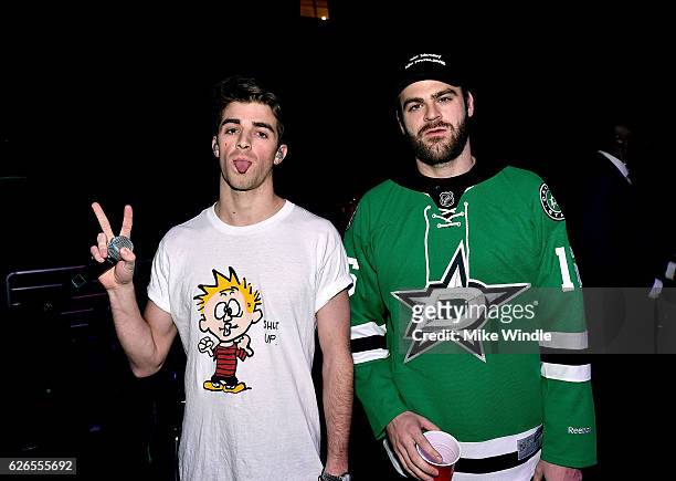 Recording artists Andrew Taggart and Alex Pall of music group The Chainsmokers pose backstage during 106.1 KISS FM's Jingle Ball 2016 presented by...