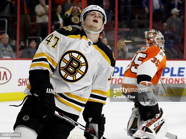 Torey Krug of the Boston Bruins reacts after he missed a shot in the overtime shootout against the Philadelphia Flyers on November 29, 2016 at Wells...