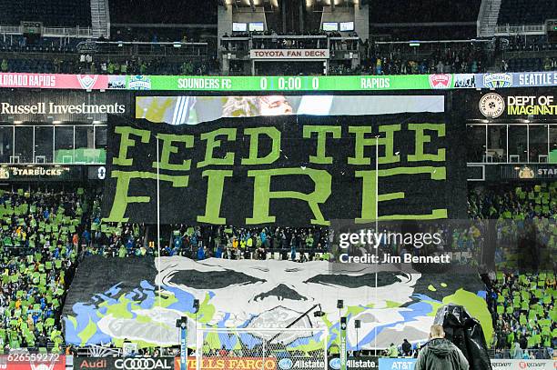 Emerald City Supporters display a tifo to show their support for the Seattle Sounders before the game at CenturyLink Field on November 22, 2016 in...