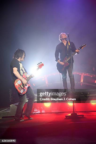 Robby Takac and Brad Fernquist of The Goo Goo Dolls perform at Brown Theatre on November 29, 2016 in Louisville, Kentucky.