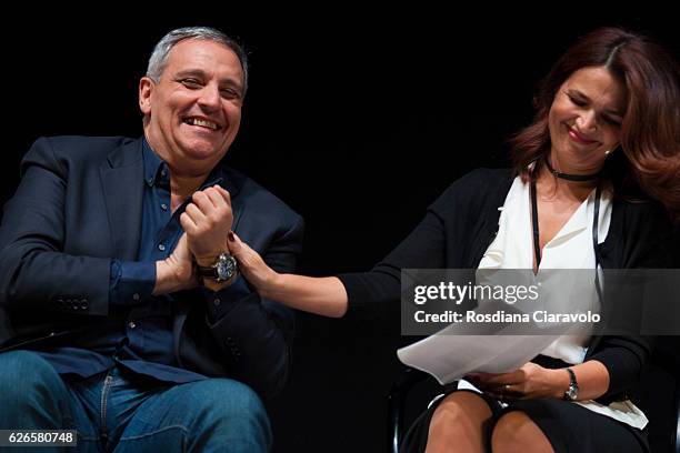 Writer Maurizio De Giovanni and Actress Tosca D'Aquino attend the reading for his novel 'Pane Per I Bastardi Di Pizzofalcone' at Teatro Diana on...